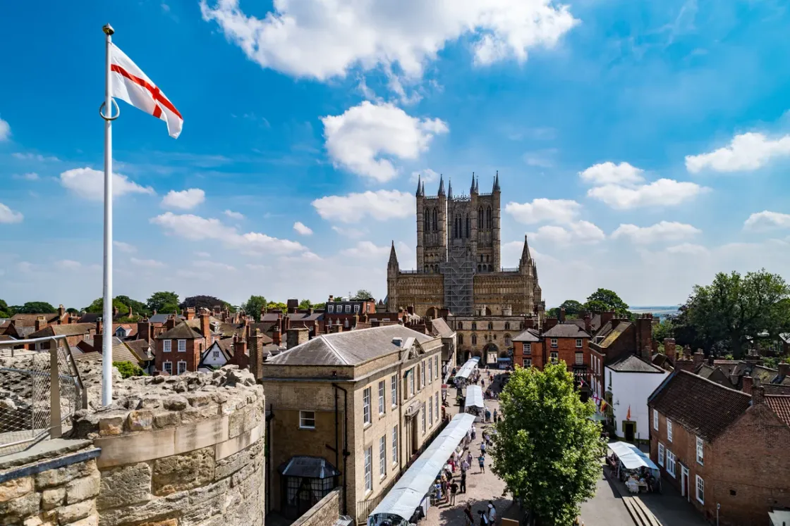 Lincoln seen from the Castle wall, market stalls below and the cathedral beyond